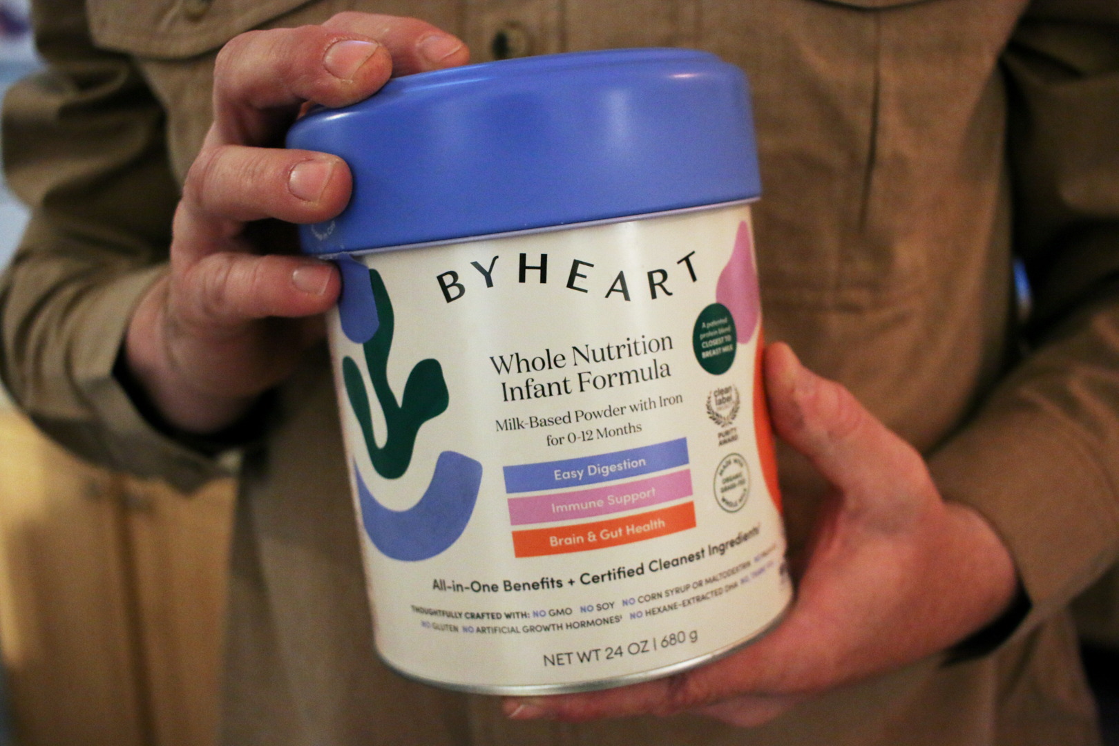 Stephen Dexter holds a container of ByHeart baby formula, which was recently recalled by ByHeart, in Flagstaff, Ariz., on Wednesday, Nov. 12, 2025.