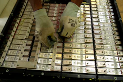 A battery production engineer at Nunam assembles a refurbished battery pack, made from used electric vehicle batteries, at their facility in Bengaluru, India, Oct. 8, 2024.