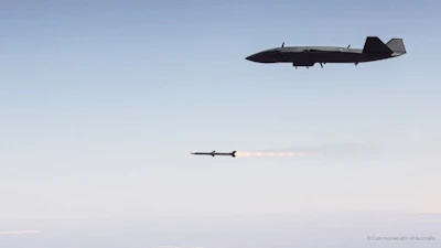 An MQ-28 Ghost Bat fires an AIM-120 missile to successfully demonstrate a force integrated air-to-air autonomous weapon engagement.