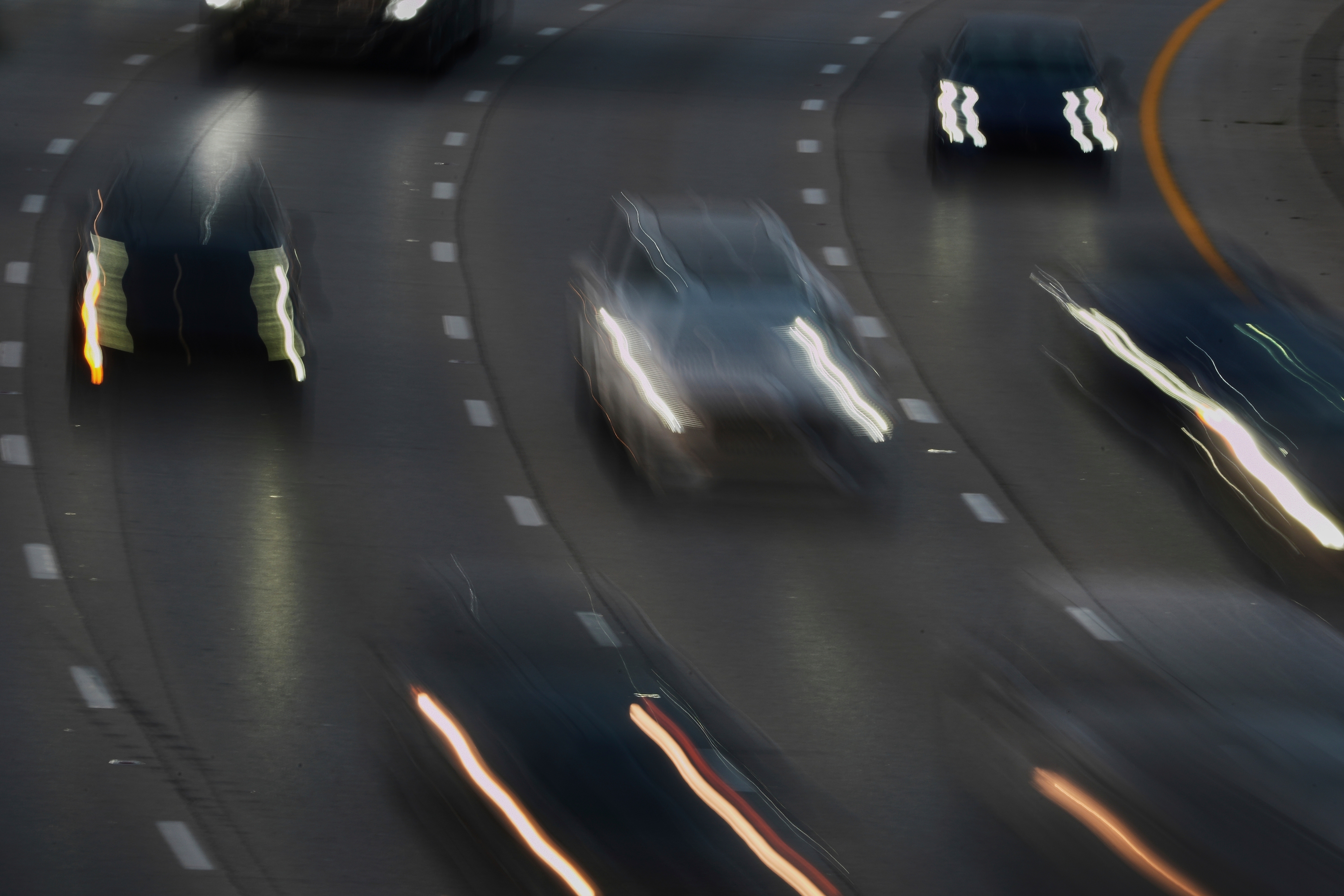 Vehicles drive along a highway July 30, 2025, in Cincinnati.