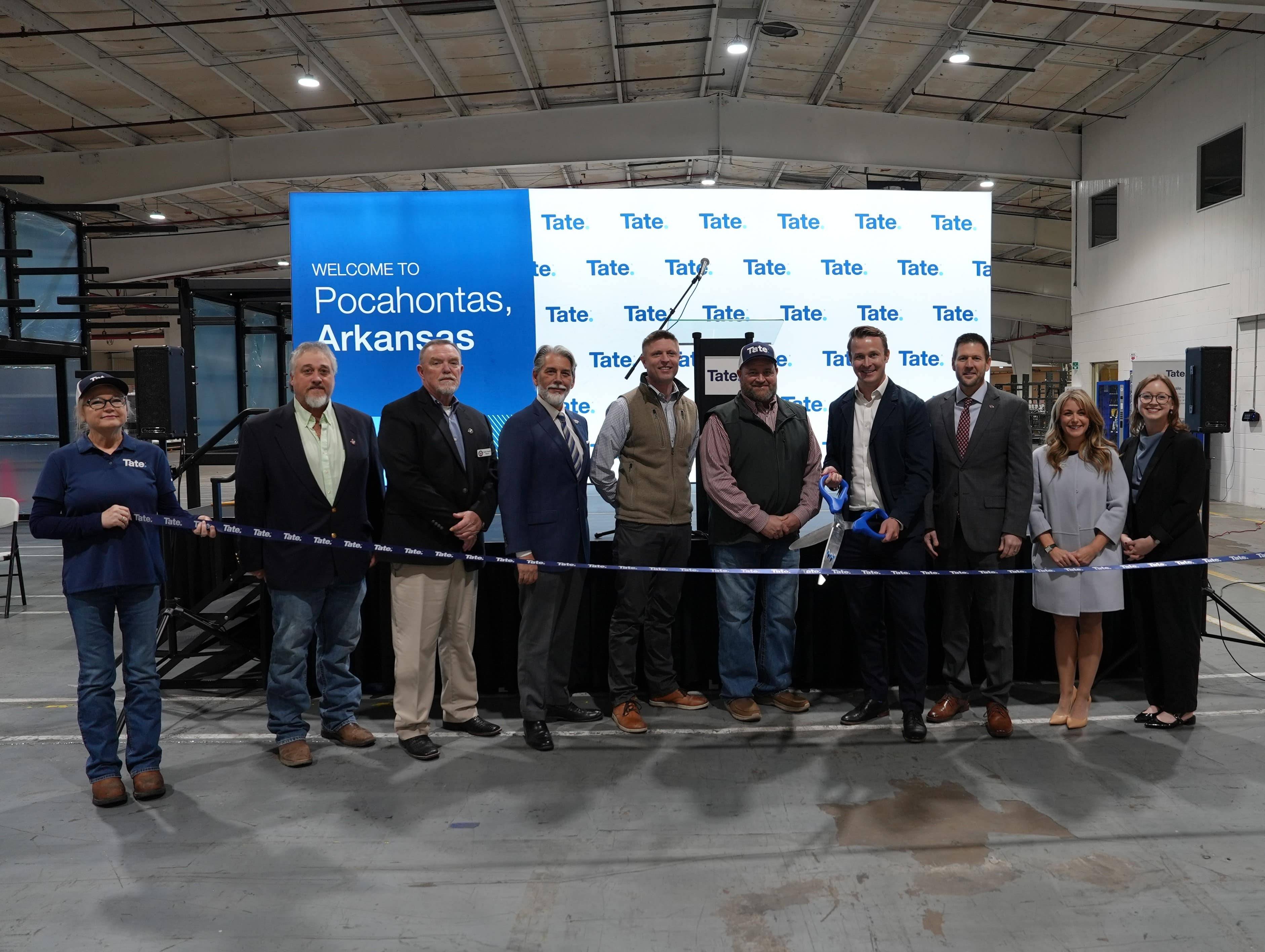 Ribbon-cutting ceremony for Tate's facility.