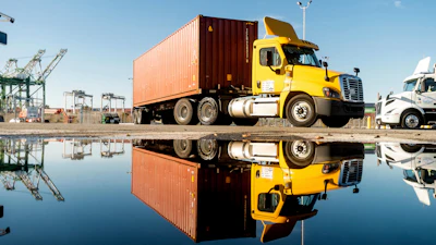A truck departs from a Port of Oakland shipping terminal on Nov. 10, 2021, in Oakland, Calif.