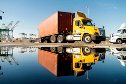 A truck departs from a Port of Oakland shipping terminal on Nov. 10, 2021, in Oakland, Calif.