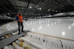Ice Master Mark Messer poses in the stadium where speed skating discipline of the Milan Cortina 2026 Winter Olympics will take place, in Rho, outskirt of Milan, Tuesday, Nov. 11, 2025.