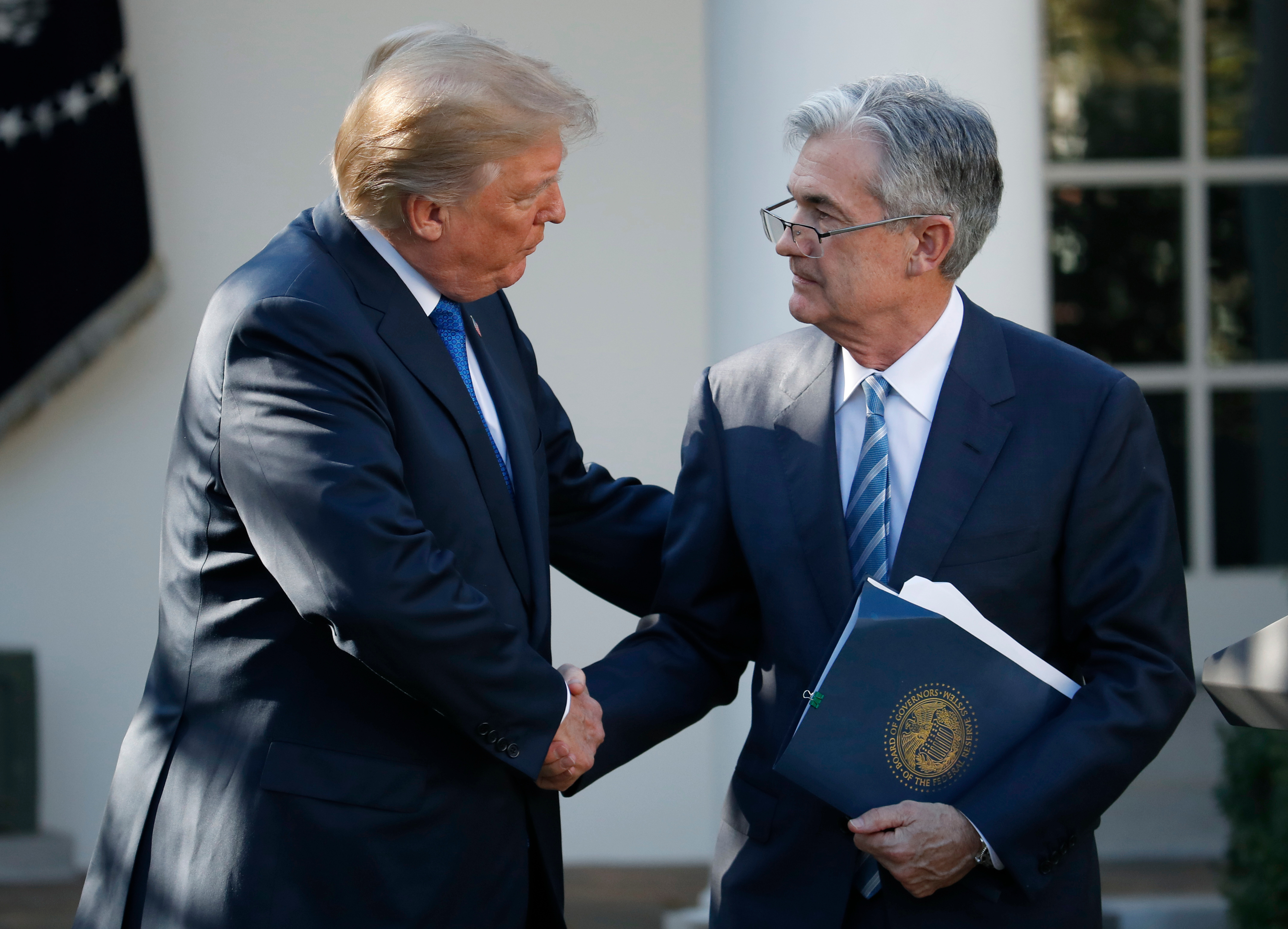 President Donald Trump shakes hands with Federal Reserve board member Jerome Powell in the Rose Garden of the White House, Nov. 2, 2017.