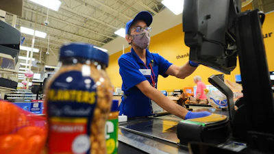 A cashier rings up groceries in Dallas, Aug. 28, 2025.