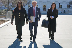 Federal Reserve Governor Lisa Cook, left, and her attorneys leave the Supreme Court in Washington, Jan. 21, 2026.