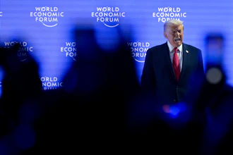 President Donald Trump walks on to the stage during the 56th annual meeting of the World Economic Forum, WEF, in Davos, Switzerland, Wednesday, Jan. 21, 2026.