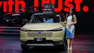 A model poses near a Honda HR-V car during the Indonesian International Motor Show in Jakarta, Indonesia, Thursday, Feb. 5, 2026.