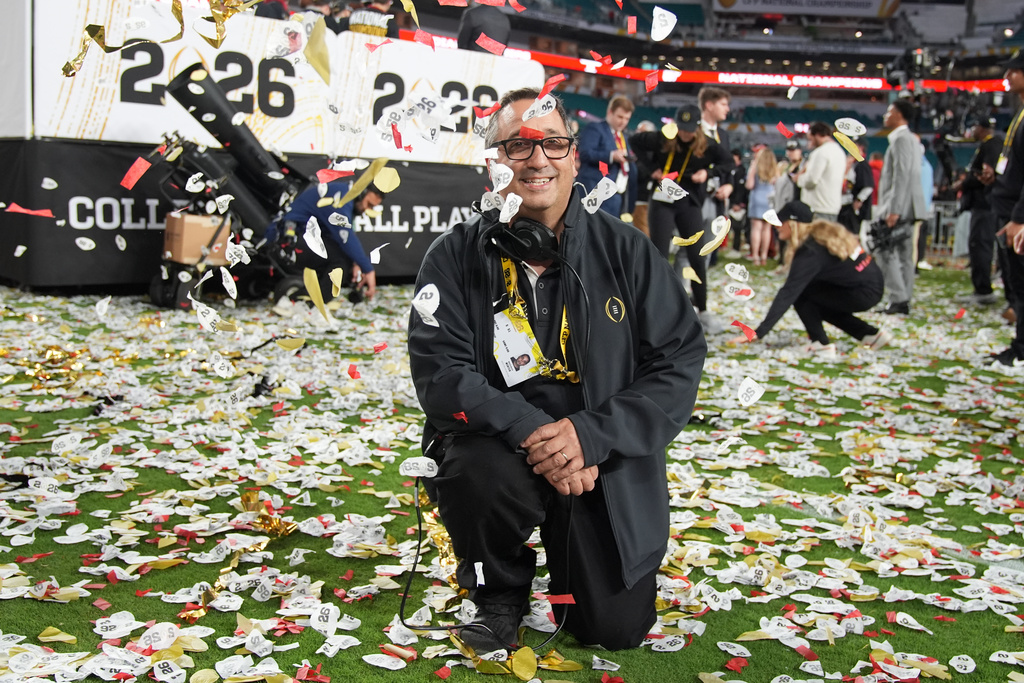 Noah Winter, responsible for the confetti displays, poses for a picture after the College Football Playoff national championship game, Monday, Jan. 19, 2026, in Miami Gardens, Fla.