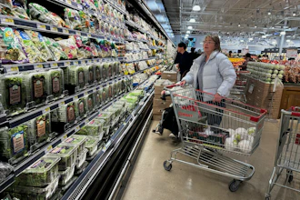 Shoppers at a grocery store in Schaumburg, Ill., Feb. 9, 2026.