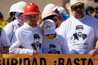 Relatives of Antonio Esparza, one of 10 mine workers abducted in neighboring Sinaloa state, during protest march in Hermosillo, Mexico, Saturday, Feb. 14, 2026.
