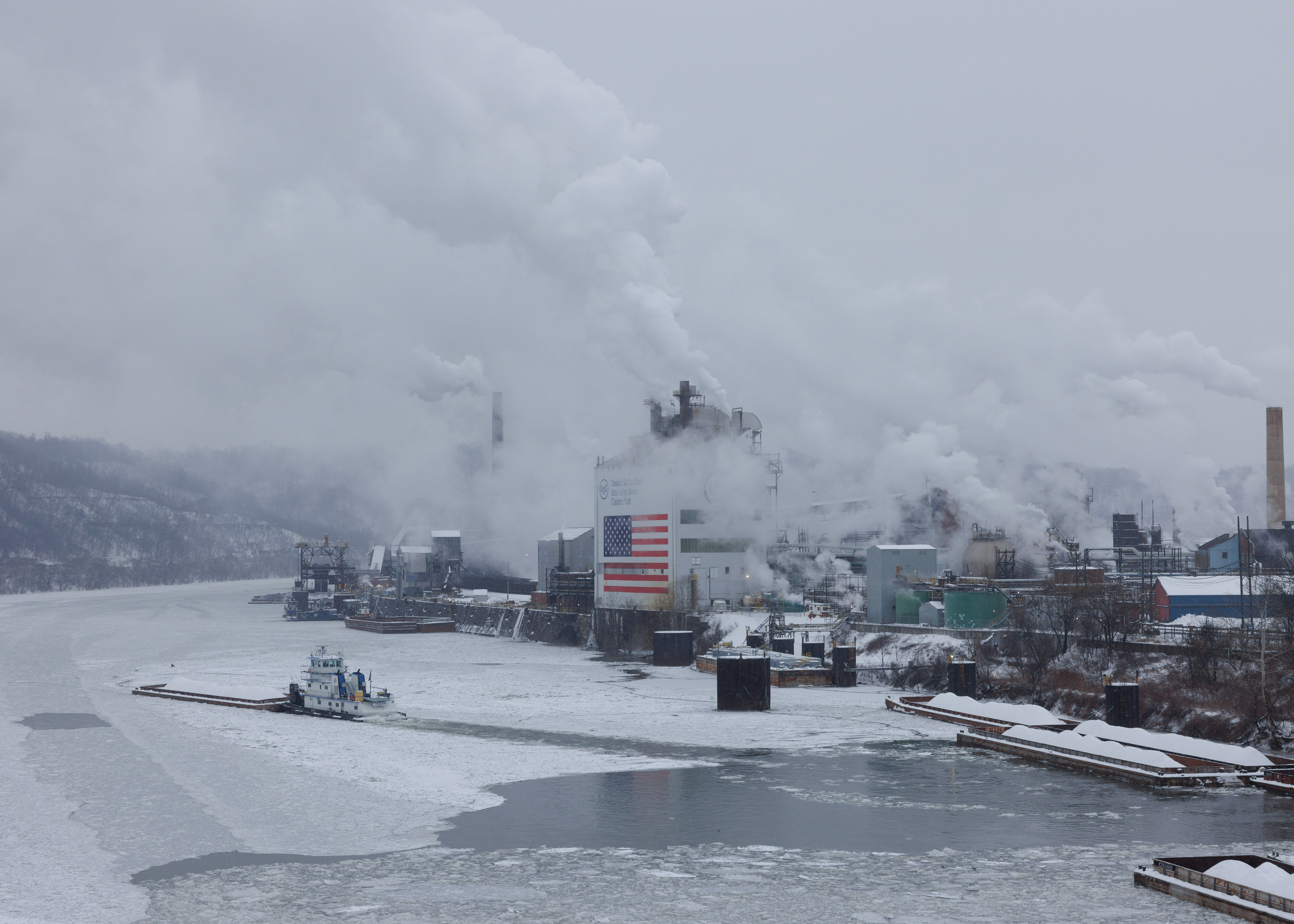A barge departs along the Monongahela River from U.S. Steel's Clairton Coke Works in Clairton, Pa., on Sunday, Feb. 1, 2026.