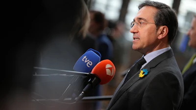 Spain Foreign Minister Jose Manuel Albares Bueno speaks with media in Brussels, Feb. 23, 2026.