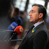 Spain Foreign Minister Jose Manuel Albares Bueno speaks with media in Brussels, Feb. 23, 2026.