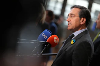 Spain Foreign Minister Jose Manuel Albares Bueno speaks with media in Brussels, Feb. 23, 2026.