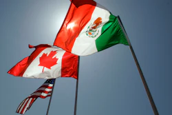 The flags of the United States, Canada, and Mexico fly in the breeze in New Orleans, where leaders of the North American Free Trade Agreement met on April 21, 2008.