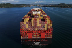 A cargo ship moves through the Panama Canal, March 25, 2026.