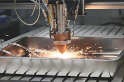 A close-up of a laser-directed energy deposition (LDED) system fabricating the novel AI-designed ultra-high strength steel, which achieves a rare balance of strength and ductility, excellent corrosion resistance, and requires only six hours of single-step heat treatment at low cost.