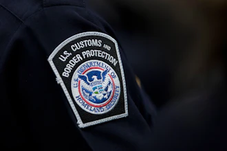 U.S. Customs and Border Protection patch on dark uniform sleeve