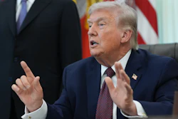 President Donald Trump answers questions from reporters after signing an executive order in the Oval Office of the White House Tuesday, March 31, 2026, in Washington.