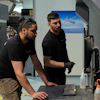 Workers operate a 3D printer that makes drone parts at the headquarters of Masssivit in Lod, Israel, March 30, 2026.