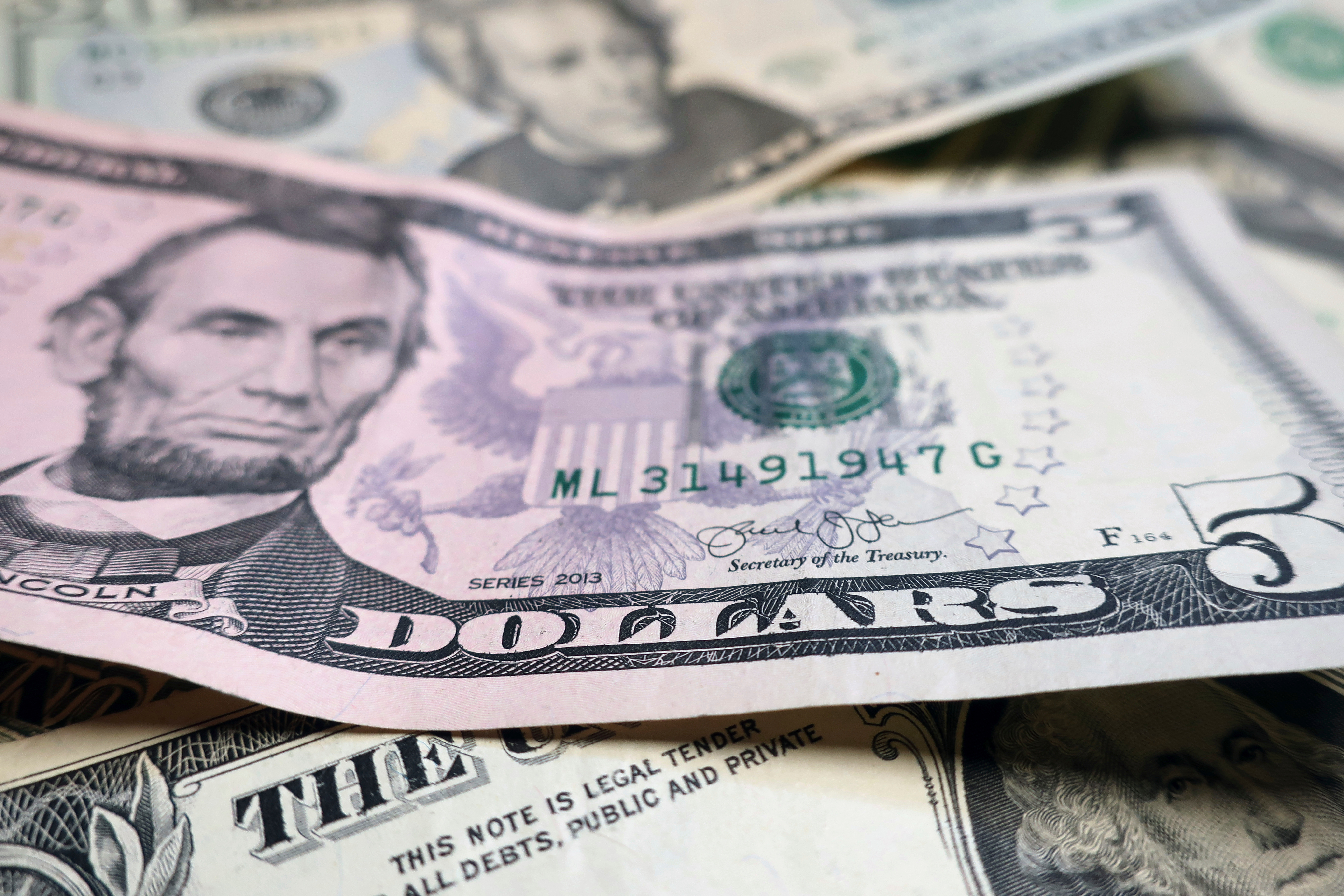 U.S. currency shown in New York, June 6, 2018.