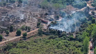 This photo released by Xinhua News Agency, this aerial drone photo taken May 5, 2026 shows rescuers working on site after an explosion at a fireworks plant in Guandu Town of Liuyang, central China's Hunan Province.
