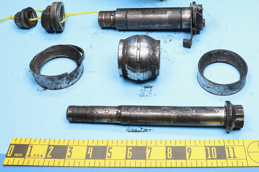 This photo released by the National Transportation Safety Board (NTSB) on Nov. 20, 2025, shows the spherical bearing and other pieces of the damaged mount of the engine that flew off a UPS cargo plane in Louisville, Ky., on Nov. 4, 2025.