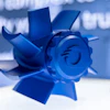 A blue CNC part created by Quickparts.