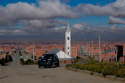 Simón Huanca drives his electric vehicle through the streets of El Alto, Bolivia, Friday, April 24, 2026.