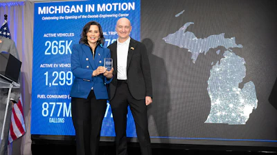 The opening of Geotab's Engineering Center in Madison Heights was celebrated alongside Michigan Governor Gretchen Whitmer (left) and Neil Cawse, founder and CEO of Geotab.