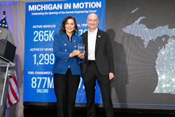 The opening of Geotab's Engineering Center in Madison Heights was celebrated alongside Michigan Governor Gretchen Whitmer (left) and Neil Cawse, founder and CEO of Geotab.