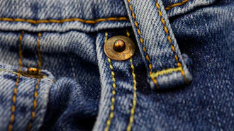 Detail of a pair of worn blue jeans in Phoenix, May 11, 2026.