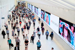 Commuters walk through a corridor in the World Trade Center Transportation Hub in New York on June 21, 2019.