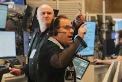 Options trader Anthony Spina, foreground, works on the floor of the New York Stock Exchange, Thursday, April 30, 2026.