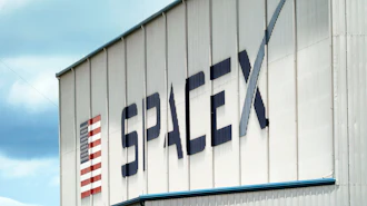 A SpaceX logo is displayed on a building, May 26, 2020, at the Kennedy Space Center in Cape Canaveral, Fla.