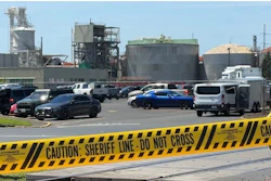 Yellow police tape is seen on May 27, 2026 outside the Longview, Wash. paper mill where a deadly chemical tank failure occurred.