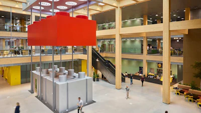 Lego's new manufacturing hub includes a 25‑tonne red 2x4 LEGO brick installation.