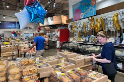 Customers shop at a grocery store in Chicago, June 25, 2026.