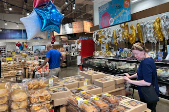 Customers shop at a grocery store in Chicago, June 25, 2026.