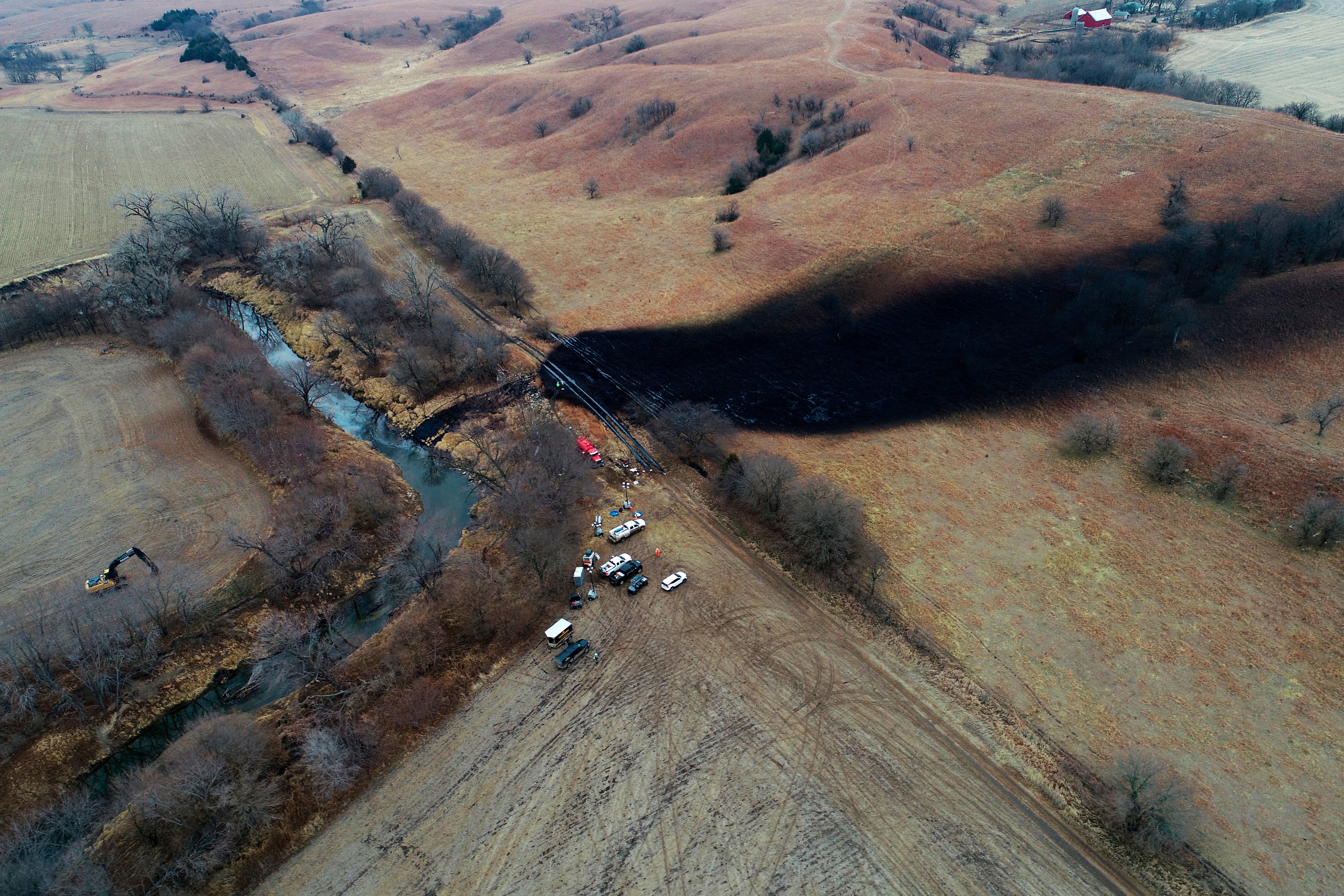 This photo taken with a drone shows the area where the ruptured Keystone pipeline dumped oil into a creek in Washington County, Kan., Dec. 9, 2022.
