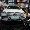 A vlogger promotes the GLC SUV at the Mercedes-Benz booth during Auto China 2026 in Beijing, on April 24, 2026. Major German carmakers saw sharp quarterly sales declines in China, as domestic demand weakened and competition heats up in the world’s biggest auto market.