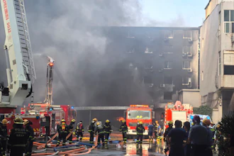 In this photo released by Xinhua News Agency, firefighters at the scene of a footwear factory fire in Jiangtou village, Chendai township of Jinjiang city, southeastern China's Fujian province, Thursday, July 9, 2026.