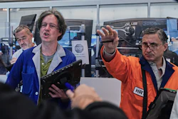 Options traders Justin Kanda, Doran Swan and Ravi Bhandari (left to right) work on the floor of the New York Stock Exchange, Thursday, June 25, 2026.