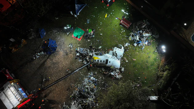 A view of the debris of a Voepass airplane that crashed the previous day, in Vinhedo, Sao Paulo state, Brazil, Aug. 10, 2024.