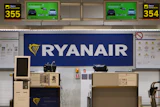 The Ryanair desk is seen, Aug. 10, 2018, at the Barajas airport in Madrid, Spain.
