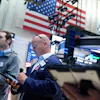 Traders work on the floor at the New York Stock Exchange in New York, Monday, July 6, 2026.