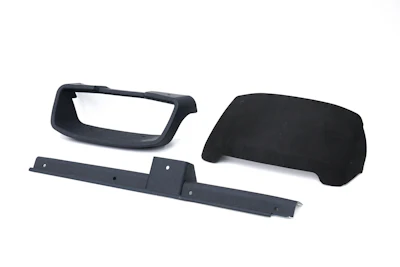 A component for the Hyundai Pony recreated through additive manufacturing using liquid resin photopolymerization technology.