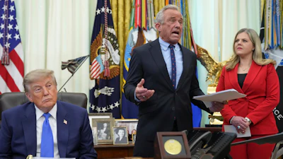 Health and Human Services Secretary Robert F. Kennedy Jr. speaks alongside President Donald Trump and Heidi Overton, deputy director of the White House Domestic Policy Council, in the Oval Office, Aug. 10, 2026.